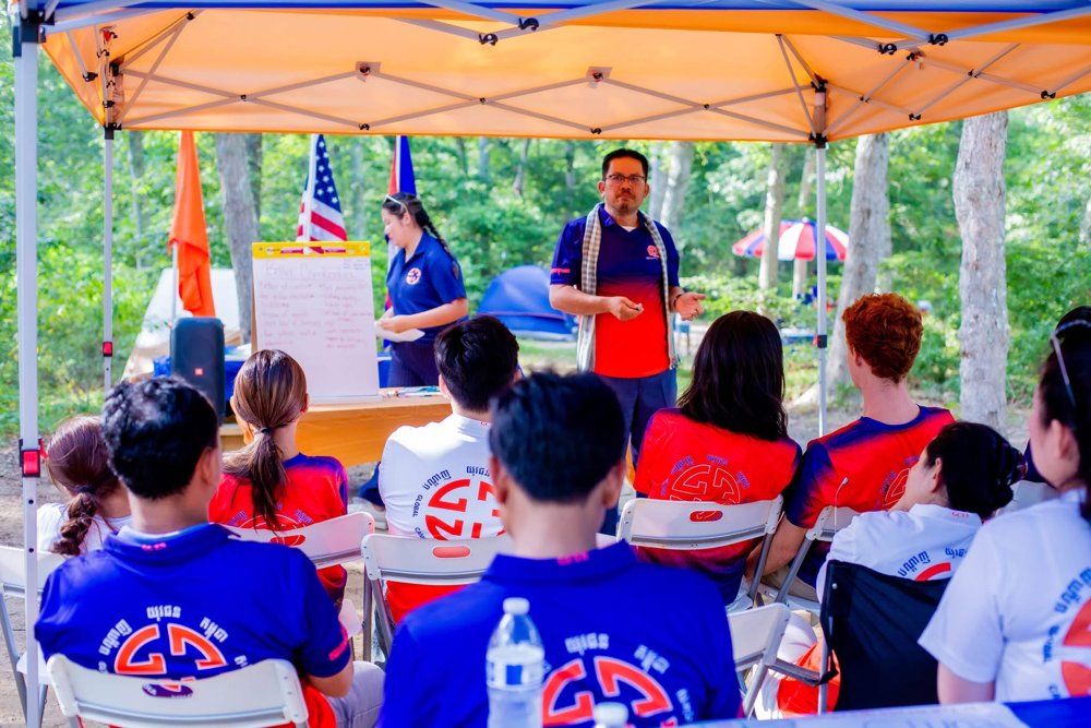 GCYN members attending a leadership session outdoors